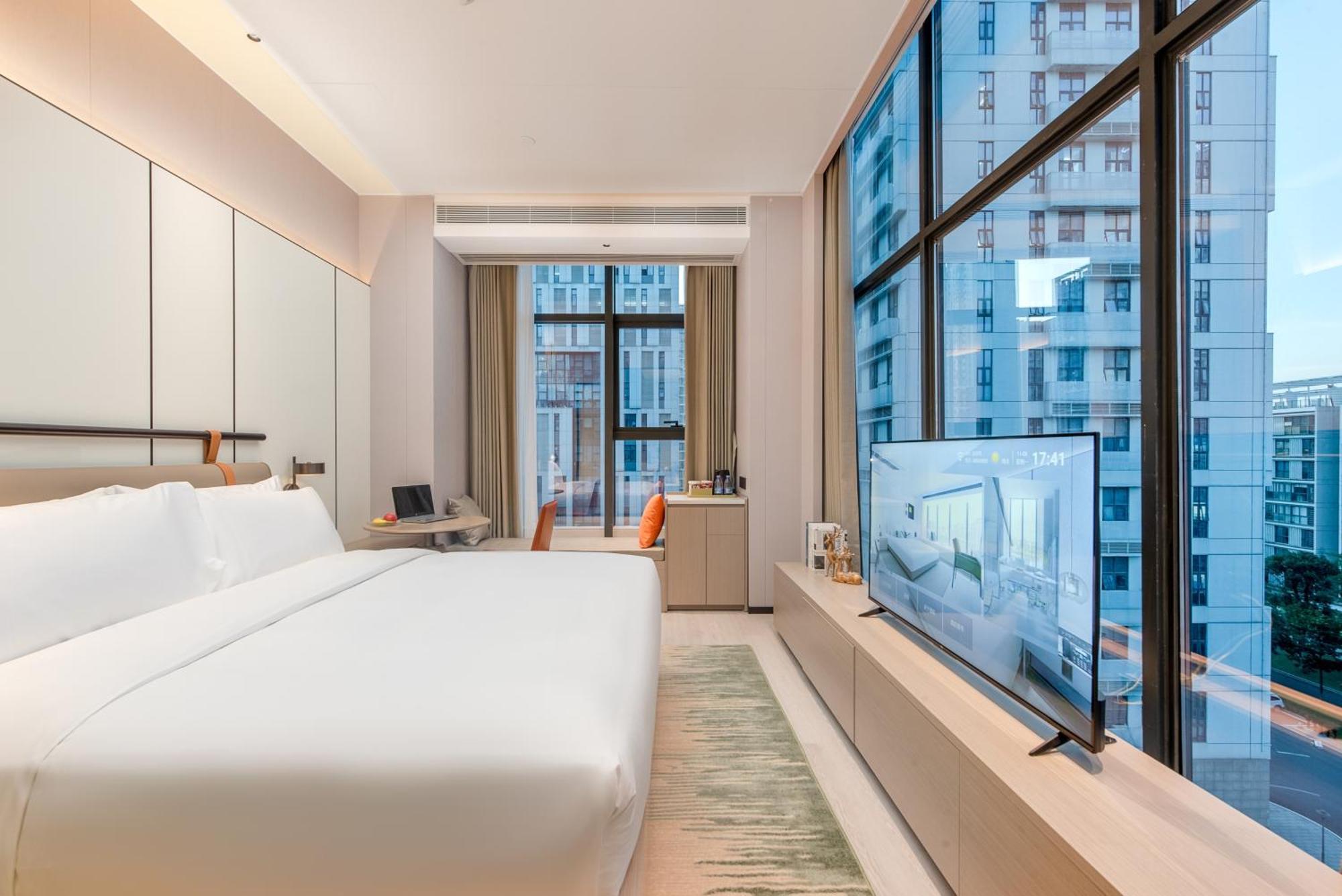 Oness Executive Hotel Guangzhou Huangpu Luogang - Free Shuttle Bus For Canton Fair מראה חיצוני תמונה